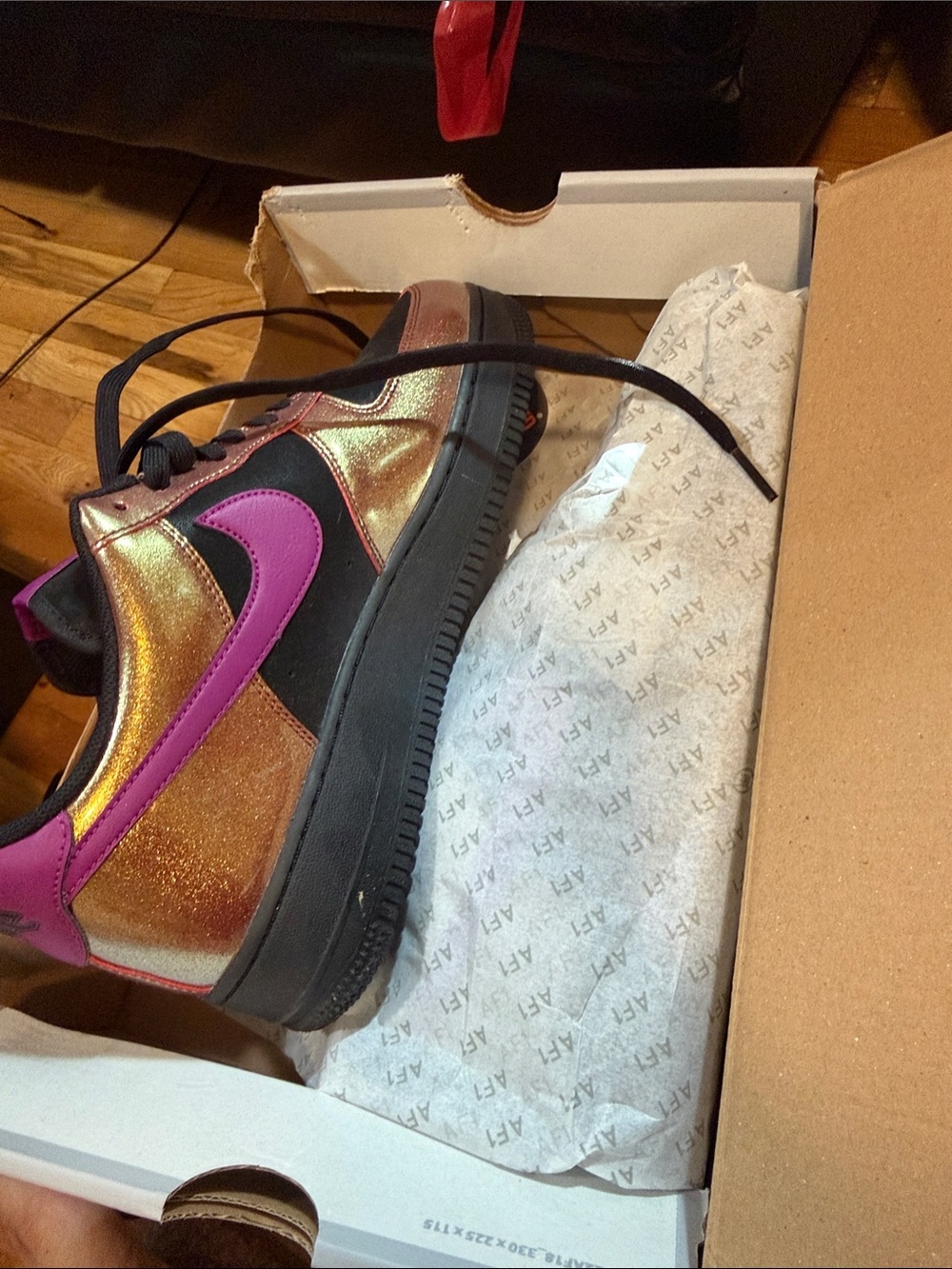 Nike Low-Top Athletic Sneakers in Pink and Metallic Gold